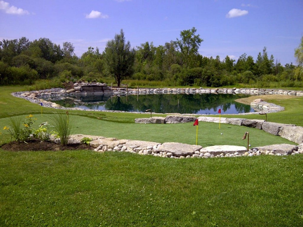 indoor putting green driving range with artificial turf installed